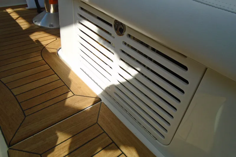 Slide: The Image of 2007 Sea Ray 40 Sundancer interior with wooden flooring and vent detail. - 19