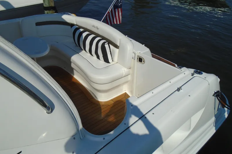 Slide: The Image of 2007 Sea Ray 40 Sundancer yacht with elegant seating and striped cushion on deck. - 3