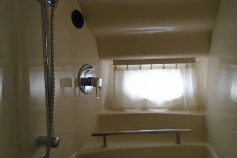 Slide: The Image of Bathroom interior of 2007 Sea Ray 40 Sundancer yacht with shower and window. - 37