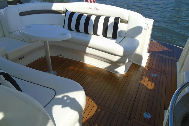 Slide: The Image of Luxurious 2007 Sea Ray 40 Sundancer yacht interior with elegant seating and wooden deck. - 39
