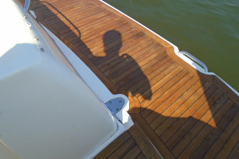 Slide: The Image of Teak deck of 2007 Sea Ray 40 Sundancer yacht with shadow. - 7