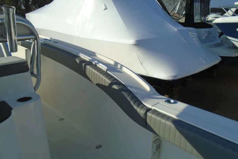 Slide: The Image of 2006 Buddy Davis 34 Center Console boat interior with sleek design and modern features. - 22