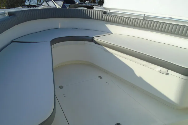 Slide: The Image of 2006 Buddy Davis 34 Center Console boat with spacious seating area. - 38