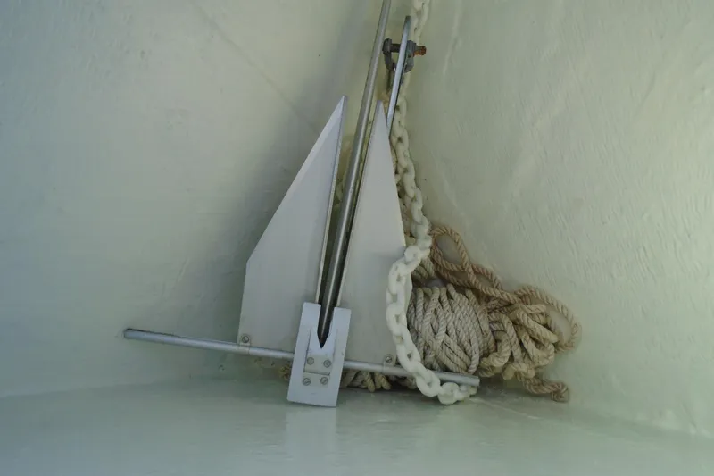 Slide: The Image of Anchor and rope storage on 2006 Buddy Davis 34 Center Console boat. - 43