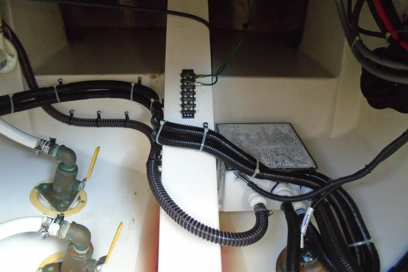 Slide: The Image of 2006 Buddy Davis 34 Center Console boat wiring and plumbing details. - 48