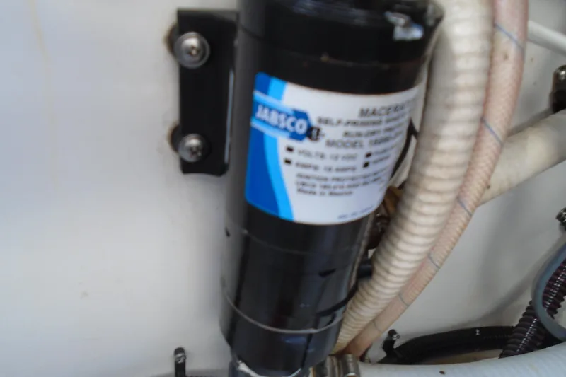Slide: The Image of Jabsco pump in 2006 Buddy Davis 34 Center Console boat engine compartment. - 50