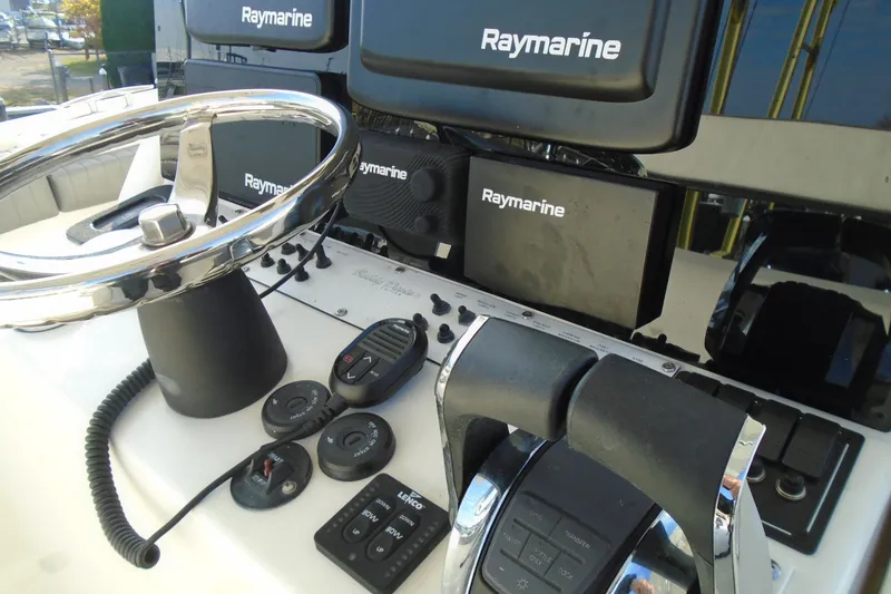 Slide: The Image of Control panel of 2006 Buddy Davis 34 Center Console with Raymarine electronics. - 53