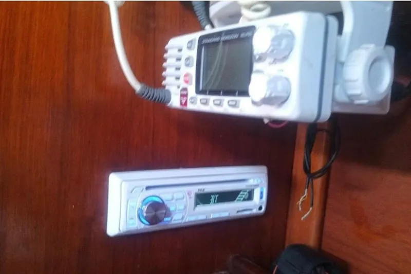 Slide: The Image of VHF radio and stereo system on 1984 Beneteau First 38.5 yacht. - 10