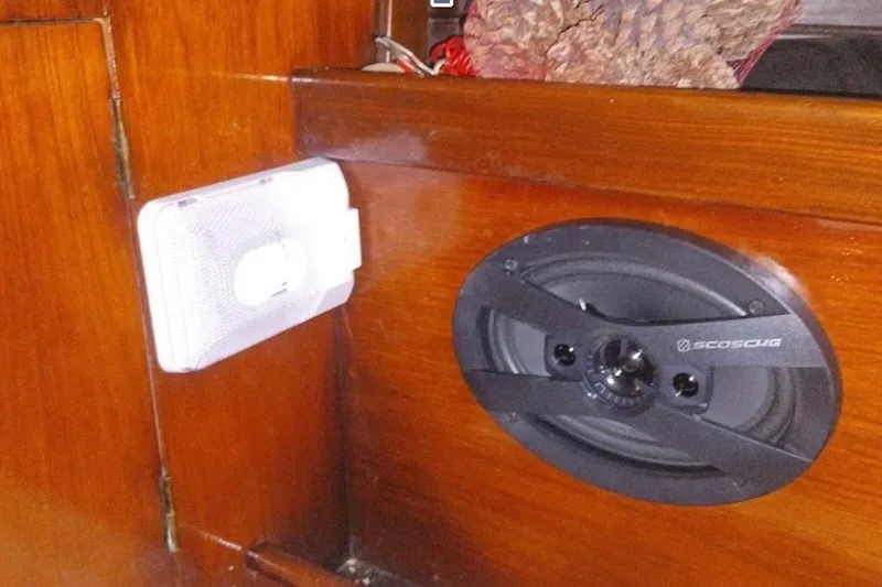 Slide: The Image of Speaker and light fixture on Beneteau First 38.5 yacht, 1984 model, wooden interior. - 11