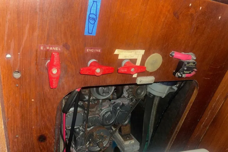 Slide: The Image of Control panel of a 1984 Beneteau First 38.5 sailboat engine compartment. - 13