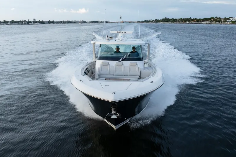 Slide: The Image of 2022 Tiara Sport 43 LS yacht cruising on open water. - 33