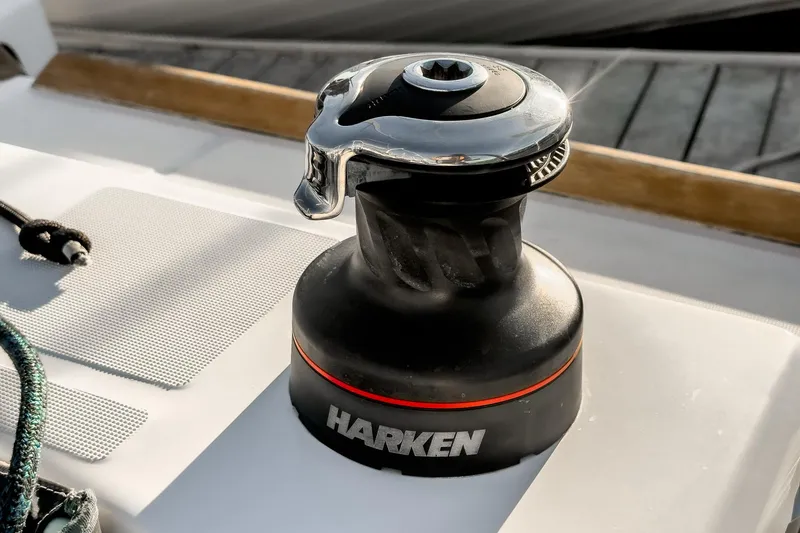 Slide: The Image of Winch on Jeanneau Sun Odyssey 349 sailboat, 2022 model, featuring Harken branding. - 48