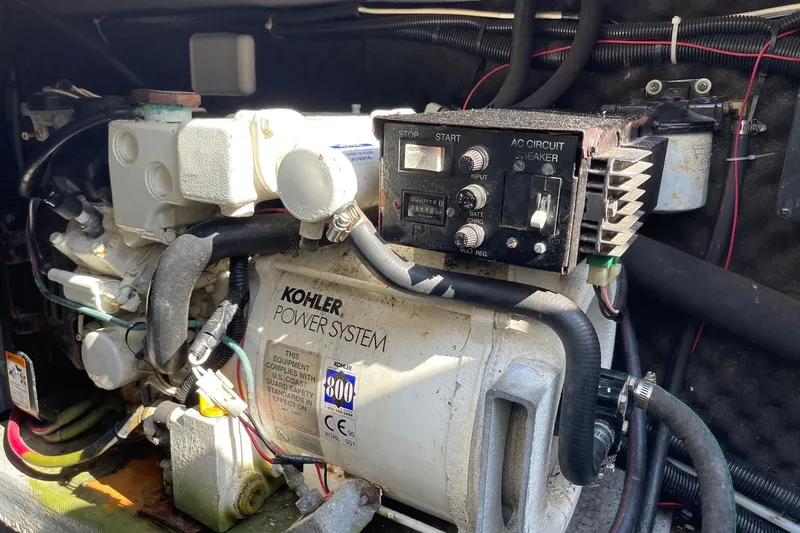 Slide: The Image of Engine compartment of a 2000 Monterey 302 Cruiser with Kohler power system. - 51