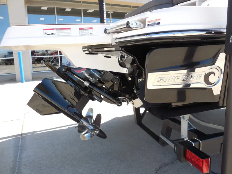 Slide: The Image of The image shows the stern of a 2026 Chaparral GTS 1 boat with a shiny propeller. - 10