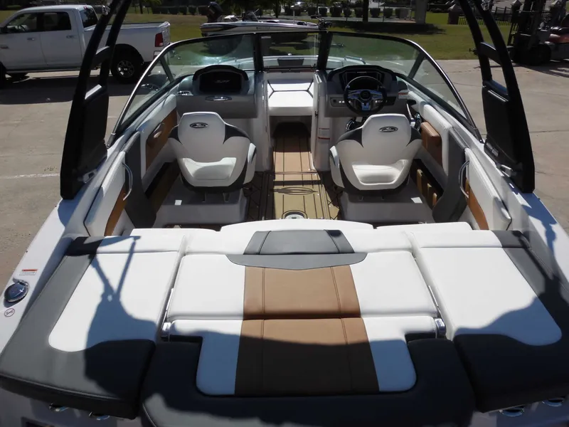 Slide: The Image of The image shows the cockpit of a Chaparral GTS 1 boat with modern seating and controls. - 12
