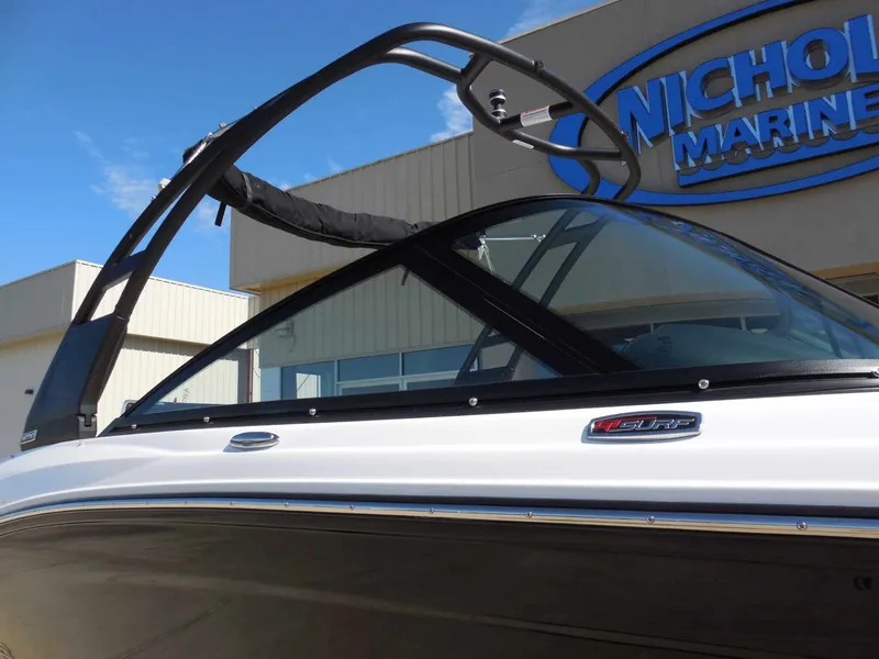 Slide: The Image of 2026 Chaparral GTS 1 with sleek design and black frame, parked in front of a building. - 9