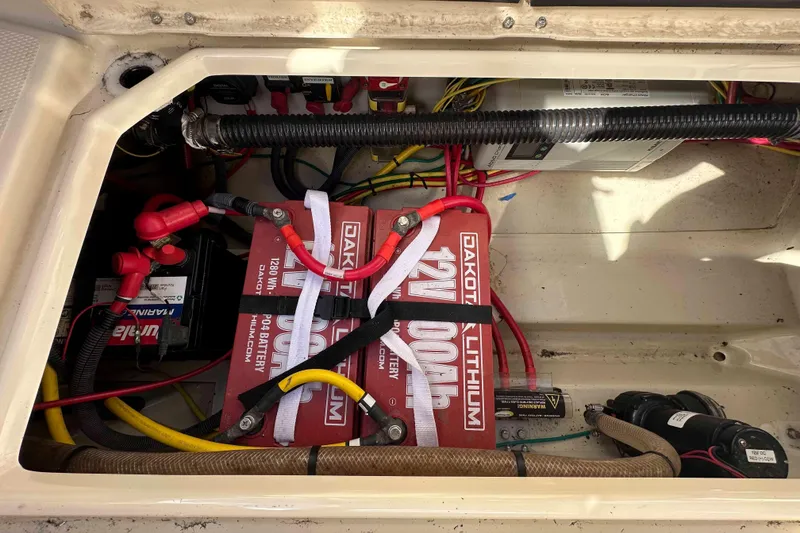 Slide: The Image of Battery compartment of a 2020 Ranger Tugs R-23 with Dakota Lithium batteries. - 27