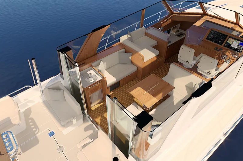 Slide: The Image of 2026 Sabre 51 Salon Express yacht interior with luxurious seating and modern helm. - 12