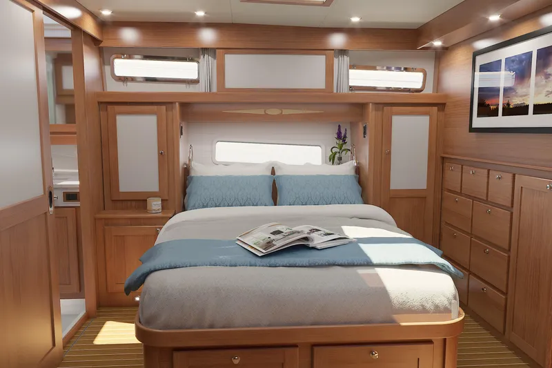 Slide: The Image of Luxurious 2026 Sabre 51 Salon Express cabin interior with elegant wood finish and cozy bedding. - 16
