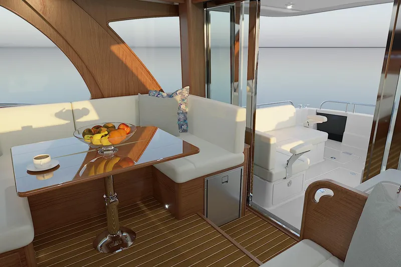Slide: The Image of Luxurious interior of 2026 Sabre 51 Salon Express yacht with elegant seating and dining area. - 5