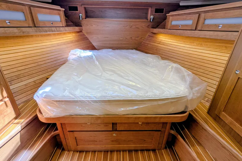 Slide: The Image of Luxurious cabin interior of 2026 Sabre 45 Salon Express yacht with wooden finish. - 22