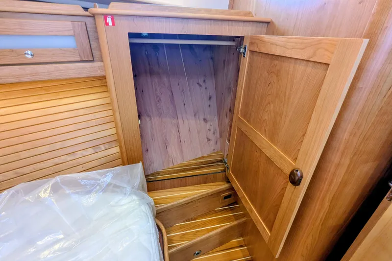 Slide: The Image of Wooden interior cabinet on 2026 Sabre 45 Salon Express yacht, showcasing craftsmanship. - 27