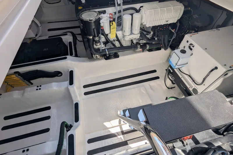 Slide: The Image of Engine room of 2026 Sabre 45 Salon Express, showcasing clean layout and modern equipment. - 32