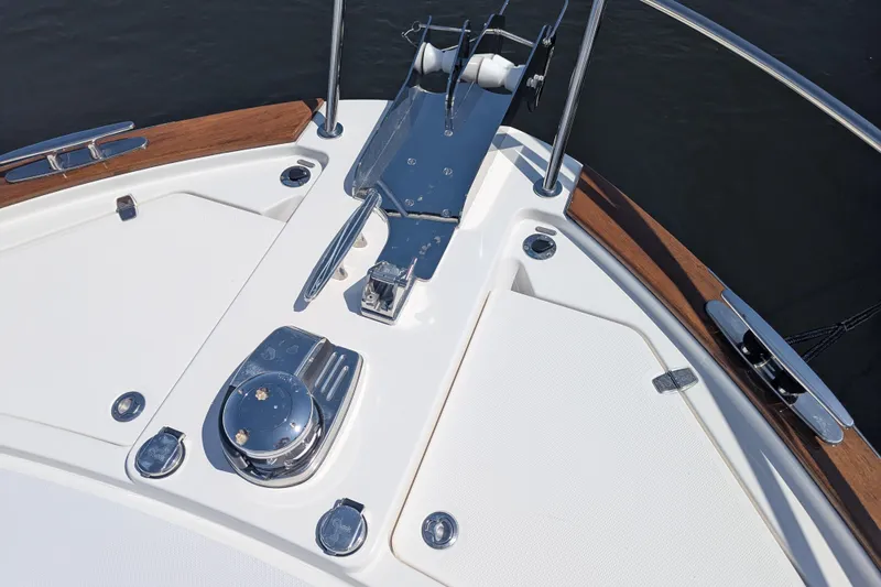 Slide: The Image of Bow deck of 2026 Sabre 45 Salon Express yacht with anchor and winch system. - 34