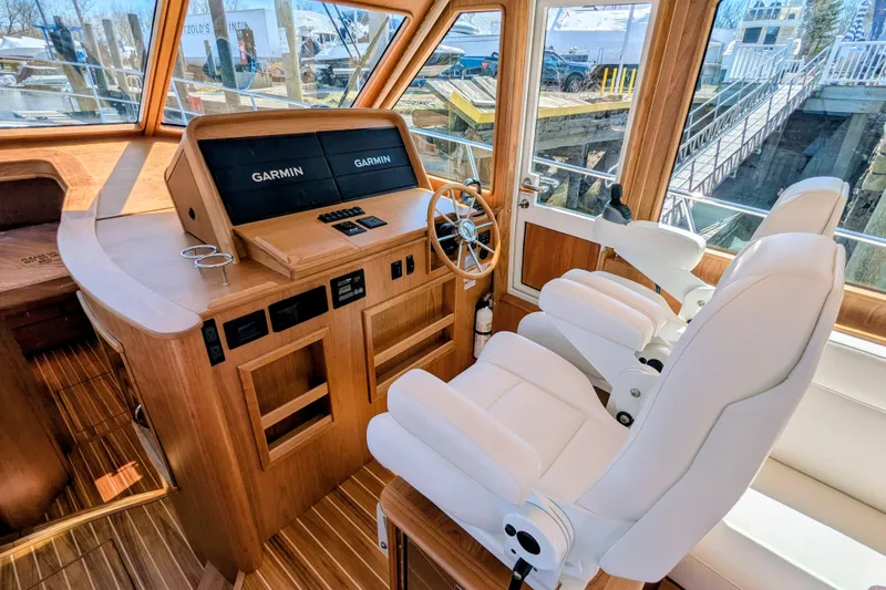 Slide: The Image of Interior of 2026 Sabre 45 Salon Express yacht with Garmin navigation system. - 9