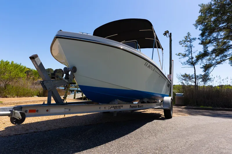 Slide: The Image of Parker 1801 Center Console boat on trailer, 2017 model, parked outdoors. - 23