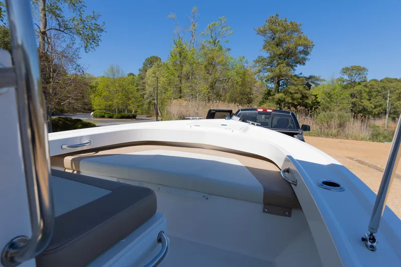 Slide: The Image of Parker 1801 Center Console boat, 2017, on trailer in a green setting. - 3