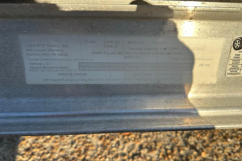 Slide: The Image of Label on Load Rite trailer for Parker 1801 Center Console, 2017 model, showing specifications. - 33