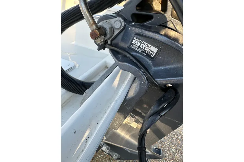 Slide: The Image of Close-up of Yamaha engine part on 2017 Parker 1801 Center Console boat. - 34