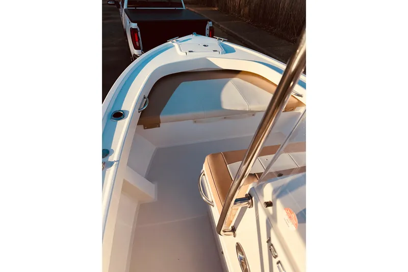 Slide: The Image of 2017 Parker 1801 Center Console boat interior with seating and console view. - 37