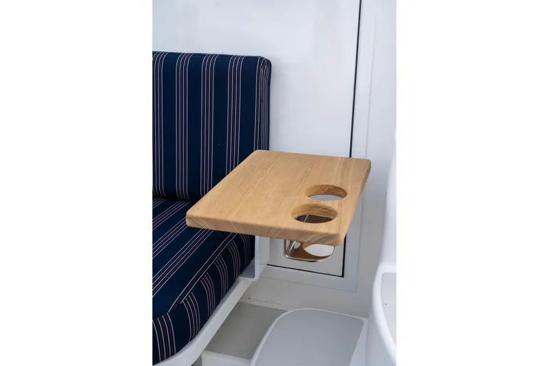 Slide: The Image of Wooden table with cup holders on Back Cove 372 boat, 2027 model. - 25