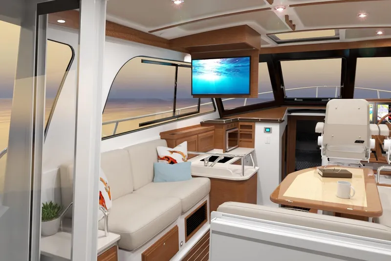 Slide: The Image of Luxurious interior of 2027 Back Cove 372 yacht with modern seating and ocean view. - 7