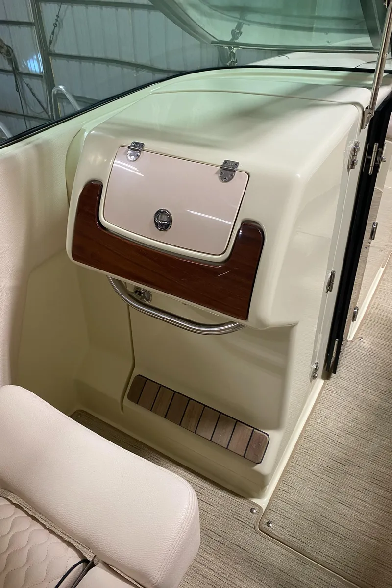 Slide: The Image of 2025 Chris-Craft Launch 28 GT interior, featuring elegant dashboard and seating. - 17