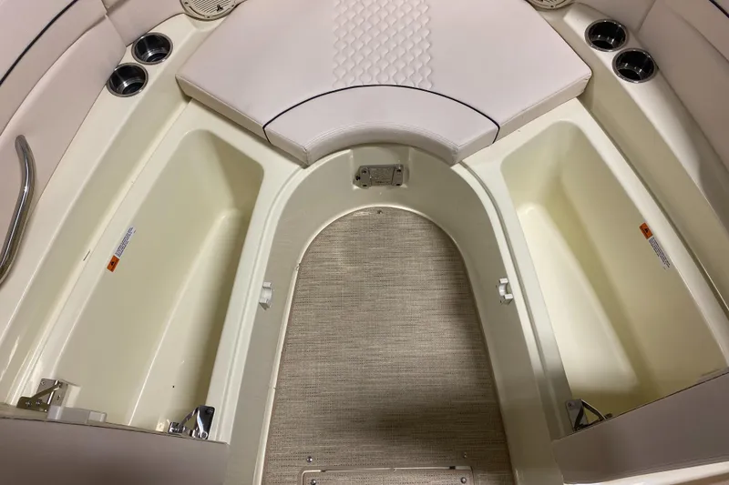 Slide: The Image of 2025 Chris-Craft Launch 28 GT interior with seating and storage compartments. - 21