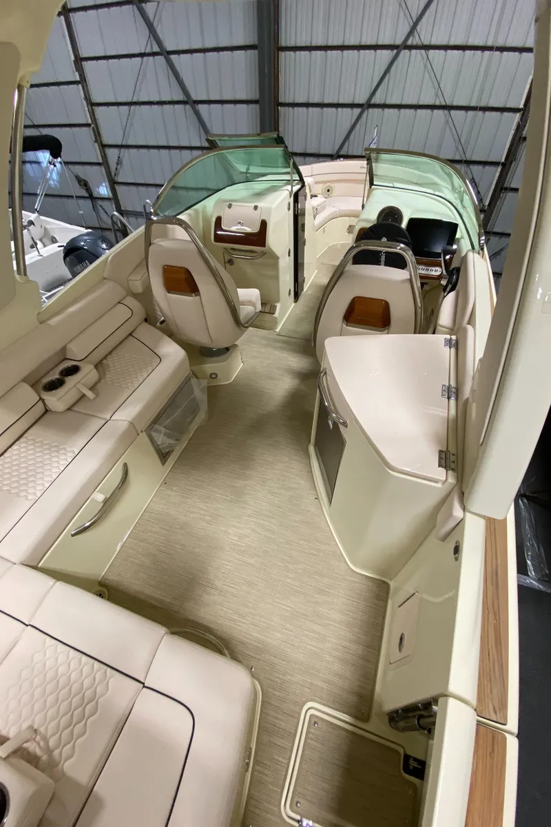 Slide: The Image of 2025 Chris-Craft Launch 28 GT interior, featuring luxurious seating and modern design. - 8