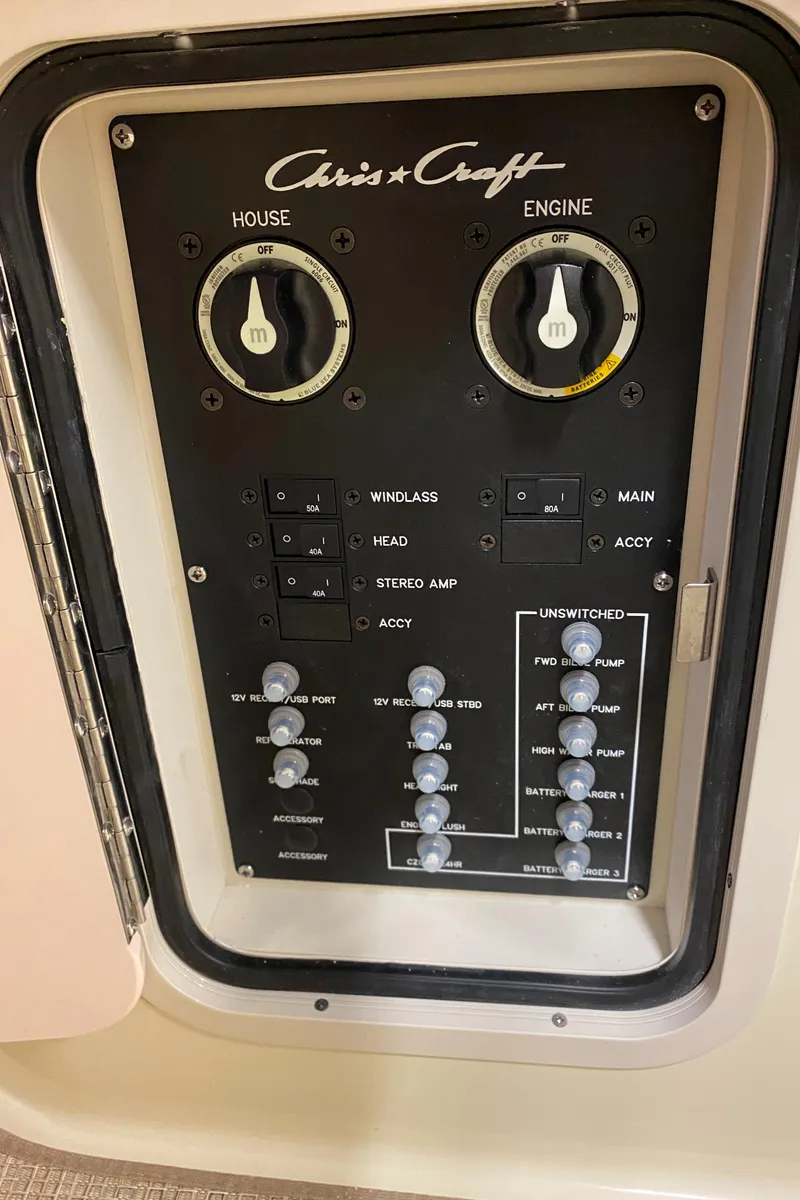 Slide: The Image of Electrical panel of 2026 Chris-Craft Catalina 28 boat, featuring switches and controls. - 25