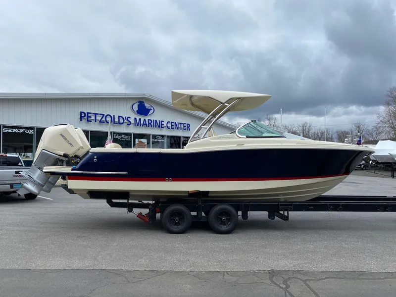 Slide: The Image of 2024 Chris-Craft Calypso 28 boat on trailer at Petzold's Marine Center. - 5