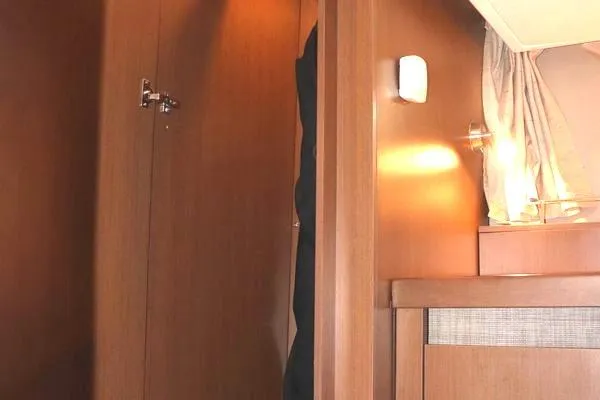 Slide: The Image of 2016 Sea Ray Sundancer 400 yacht kitchen with sink, stove, and appliances. - 14