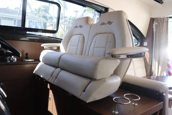 Slide: The Image of Interior cabin of 2016 Sea Ray Sundancer 400 with cozy bed and pillows. - 18