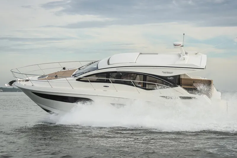 Slide: The Image of Manufacturer Provided Image: 2016 Sea Ray 400 Sundancer cruising on water. - 2