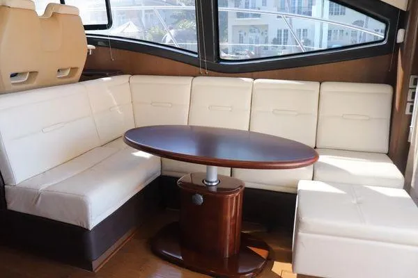 Slide: The Image of Interior cockpit of 2016 Sea Ray Sundancer 400 yacht with steering wheel and controls. - 27