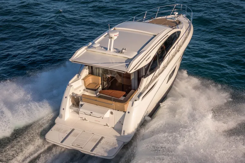 Slide: The Image of Manufacturer Provided Image: 2016 Sea Ray 400 Sundancer cruising on water. - 3