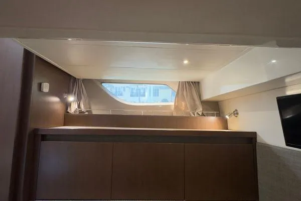 Slide: The Image of 2016 Sea Ray Sundancer 400 helm with modern controls and comfortable seating. - 32