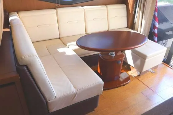 Slide: The Image of Bow of 2016 Sea Ray Sundancer 400 with anchor and railing, on calm water. - 42