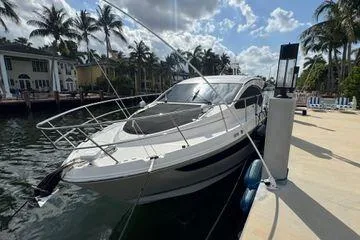 Slide: The Image of Interior of 2016 Sea Ray Sundancer 400 yacht with luxurious seating and helm. - 53