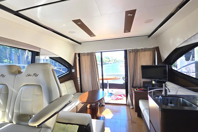 Slide: The Image of Luxurious interior of 2016 Sea Ray Sundancer 400 yacht with leather seating and modern amenities. - 56